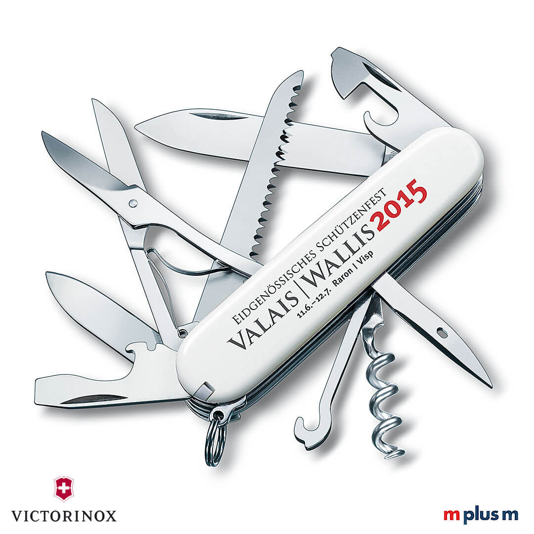 Perfekter Logo Druck auf Victorinox Huntsman mit weißen Schalen