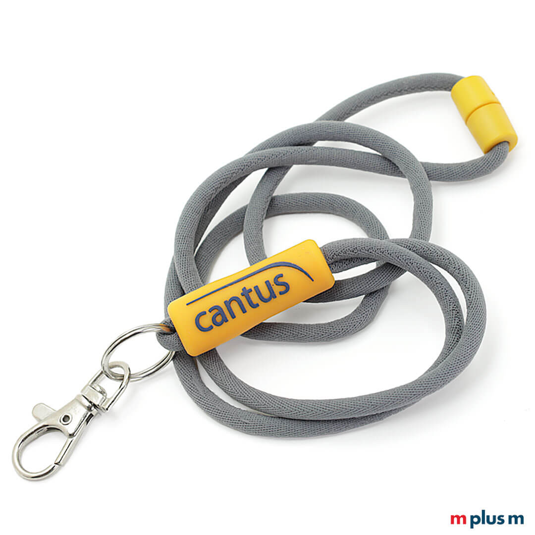 Graues Kordel Lanyard mit Logo Druck auf Soft PVC Hülse als Werbeartikel
